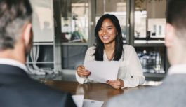 Woman smiling in an interview